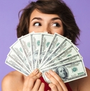 covering face with money