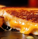 grilled cheese sandwich on black background