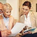 senior couple and financial advisor
