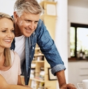 mature couple researches at home
