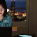 asian student sitting on desk