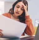 stresssed woman on laptop