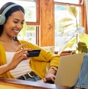 woman shopping online using card