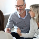 senior couple meeting financial adviser