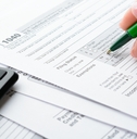female hand and tax form