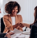 managers congratulating candidate at interview