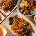 delicious chinese food on wooden table