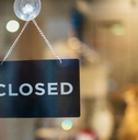 close signboard hanging outside Store