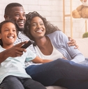 black family watching tv