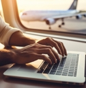using a laptop while on an airplane