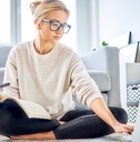 woman using laptop paying bills