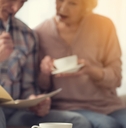 senior couple reviewing documents at home