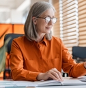 senior business woman working on laptop