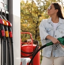 woman refueling car