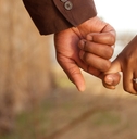 african american couple holding hands