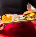 Waitress serving in American restaurant