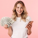 holding money and using phone