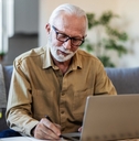 senior man reviewing investments plans