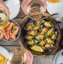 family having summer lunch with seafood