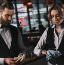 counting tips and cleaning glasses