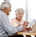  senior couple working on their finances