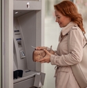 Woman using an ATM