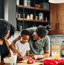 happy african american family cooking together