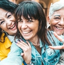 senior female friends enjoying on trip