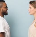 african man look at Caucasian woman