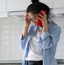 frustrated female making phone call