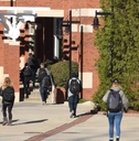College students walk around campus