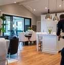 male Photographer filming real estate video