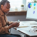 stressed senior man paying bill