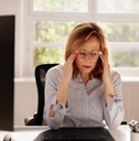 stressed female employee at office