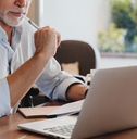 senior man using laptop 