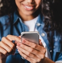 african-american woman using smart phone