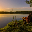 angler sitting on fishing chair 