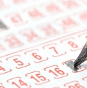 lottery ticket and pencil