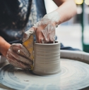 ceramics maker working with pottery