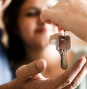 cheerful couple with keys