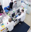 pharmacist suggesting medical drug to buyer