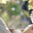 senior couple on bench at park