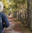 man with backpack hiking