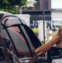 receiving coffee in drive thru 