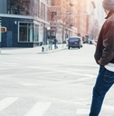 man crossing the road