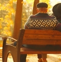senior couple on park bench
