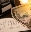 restaurant bill with tip
