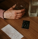 friends splitting bill on restaurent table