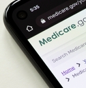 Medicare website on smartphone screen