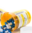 prescription medication in pharmacy vials
